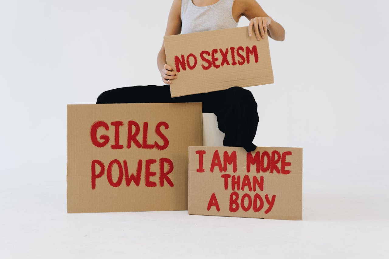 Studio shot of protest signs advocating womens empowerment and equality.